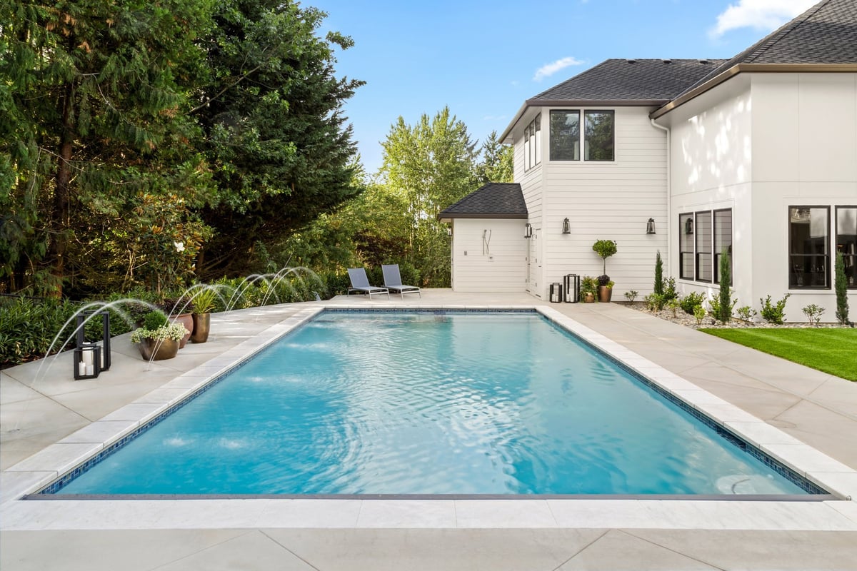 In-ground pool with blue water