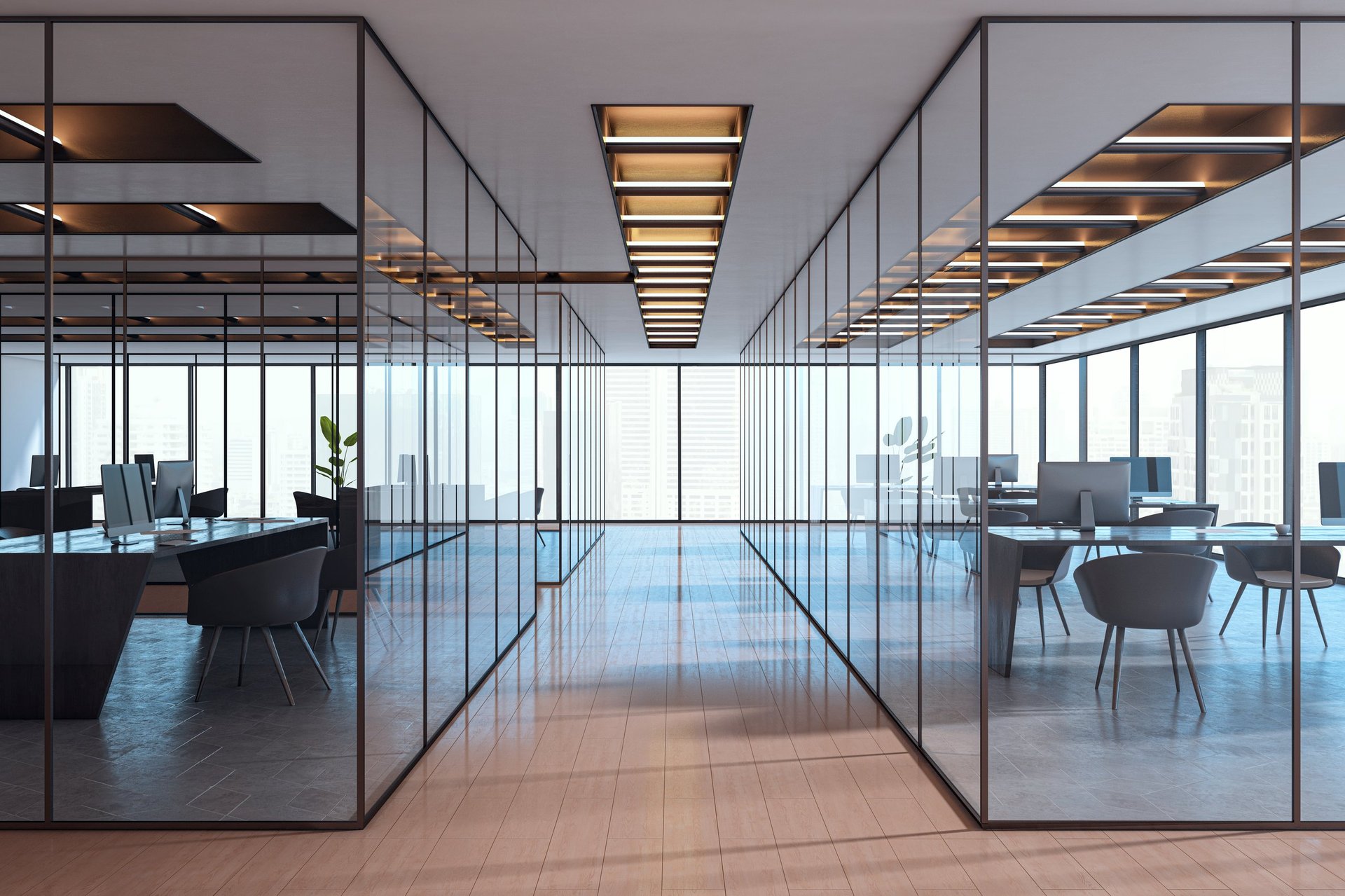 Contemporary empty office interior with glass partitions, stylish furniture and city view in background